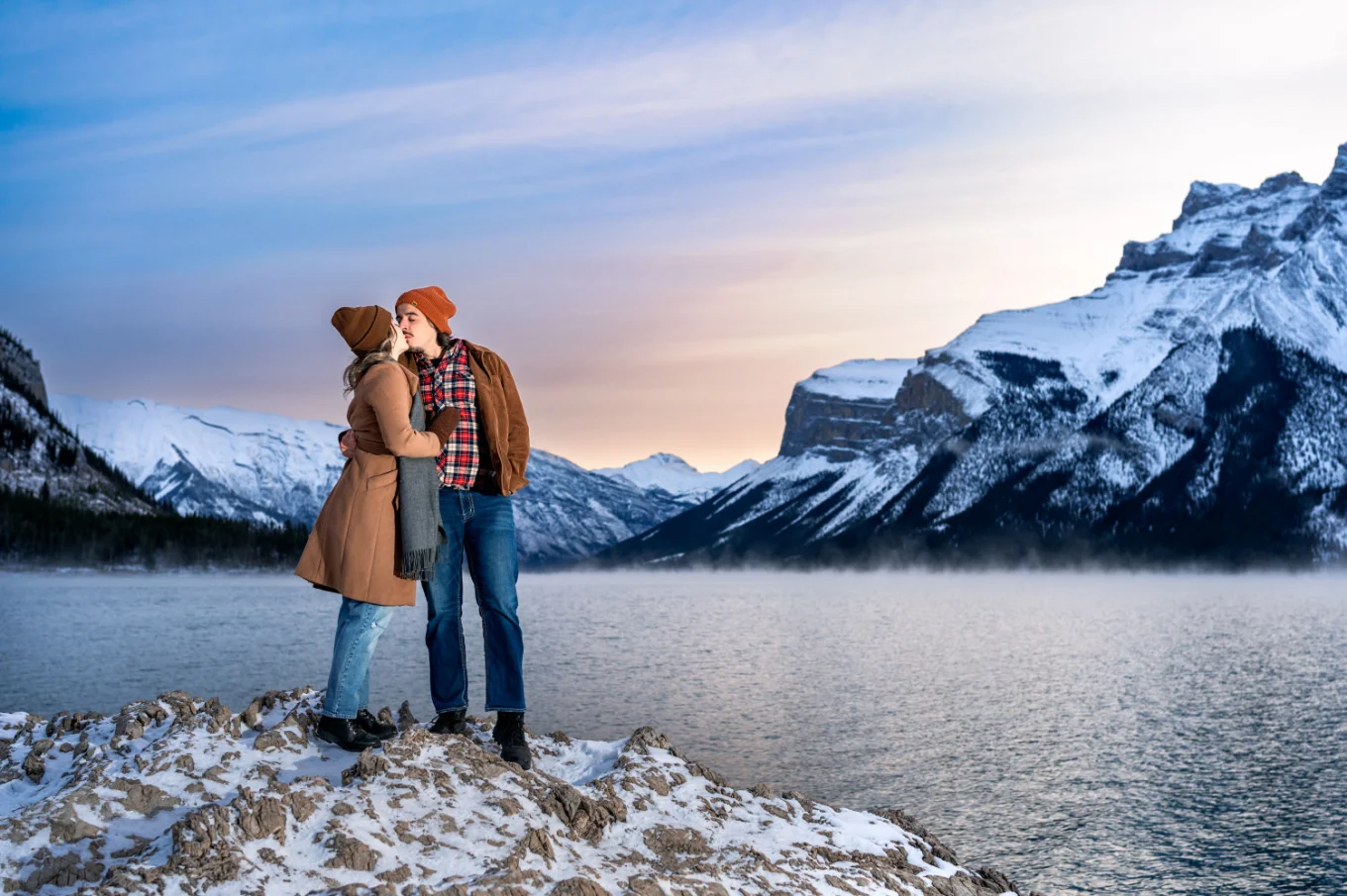 Banff Engagement Photography of the kissing couple during sunrise.