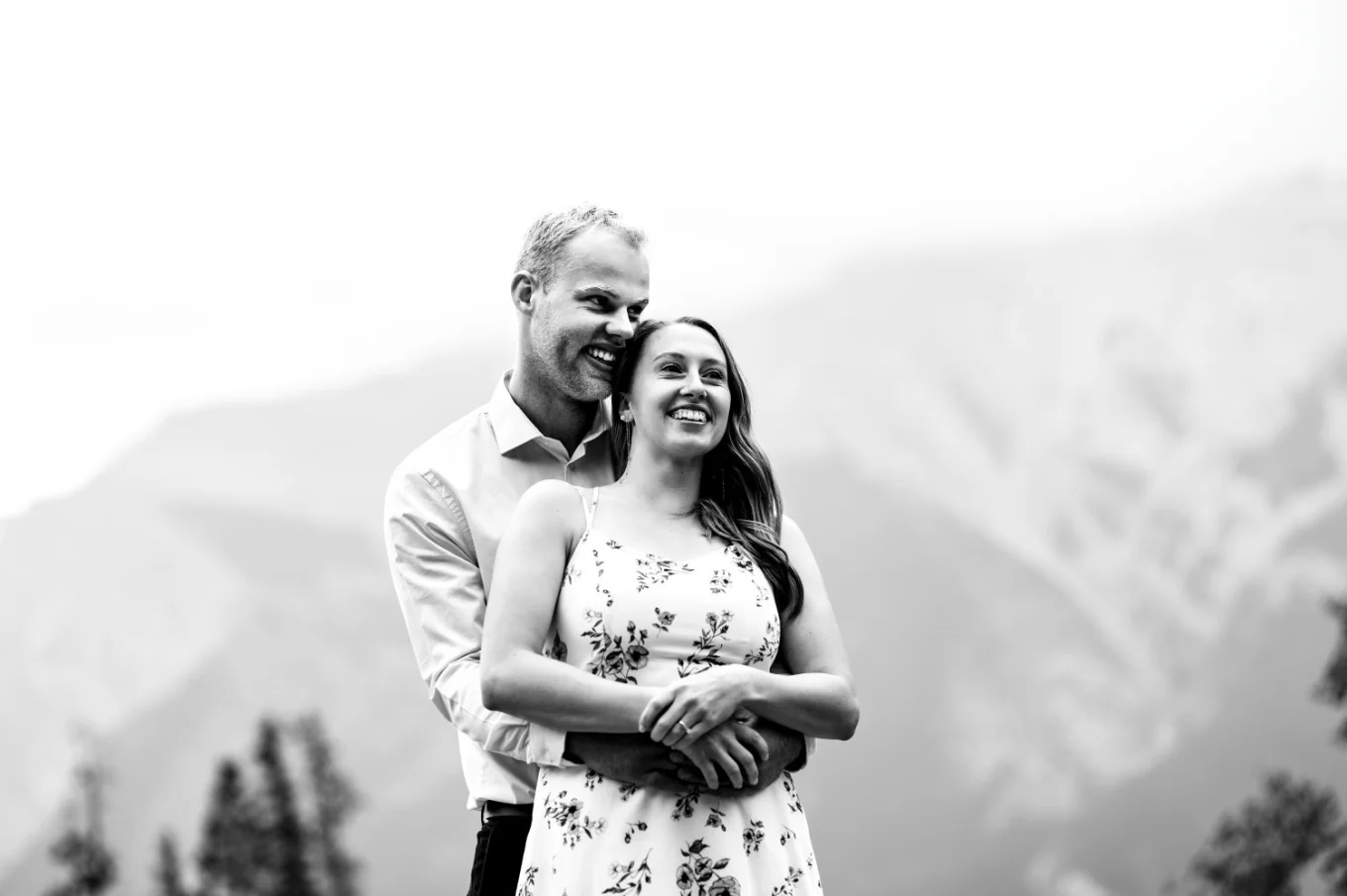 Man hugs his wife to be