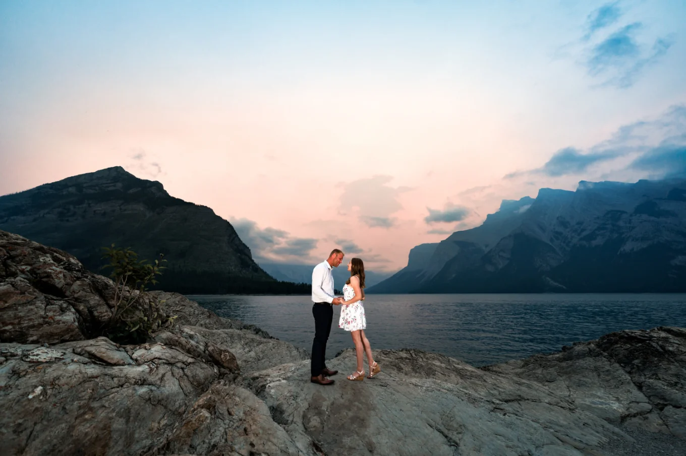 Banff Proposal Photography of the coule in love looking at each other at the lake