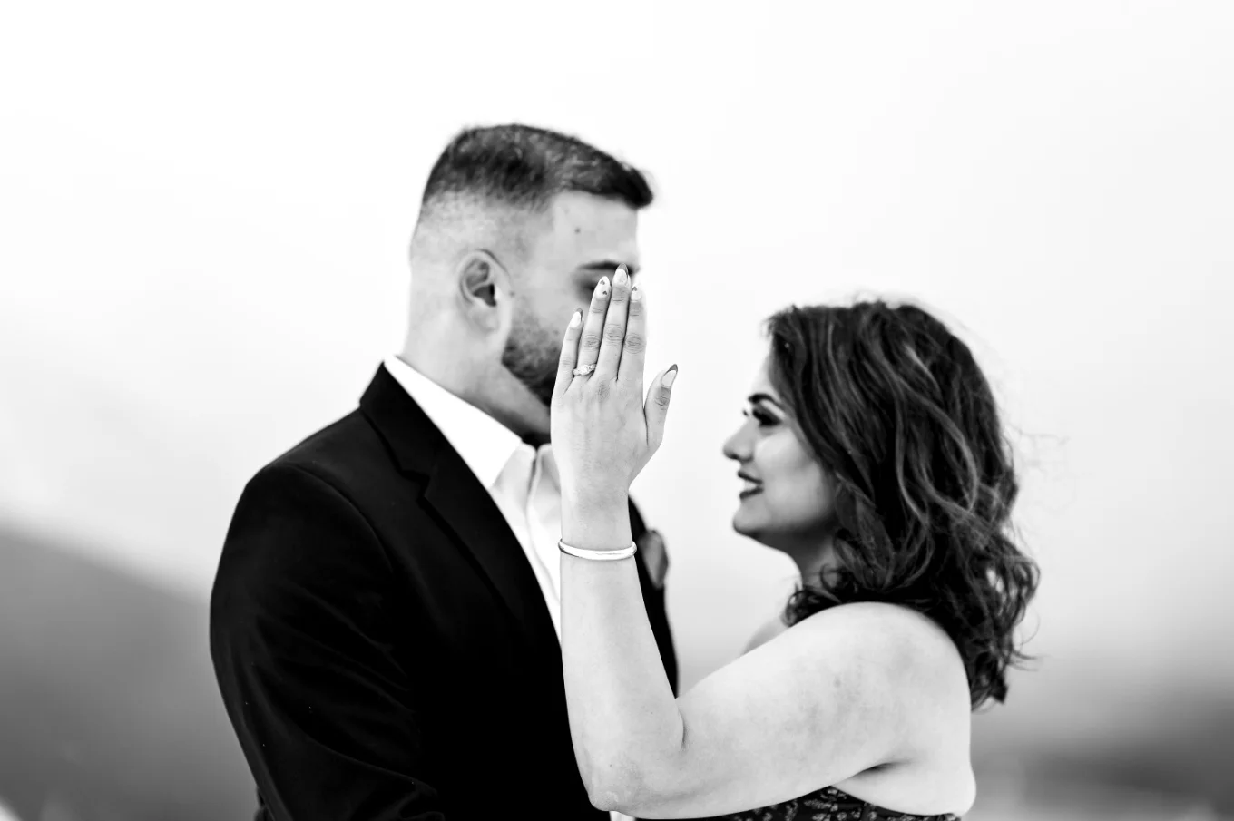 Lady shows her hand with the engagement ring