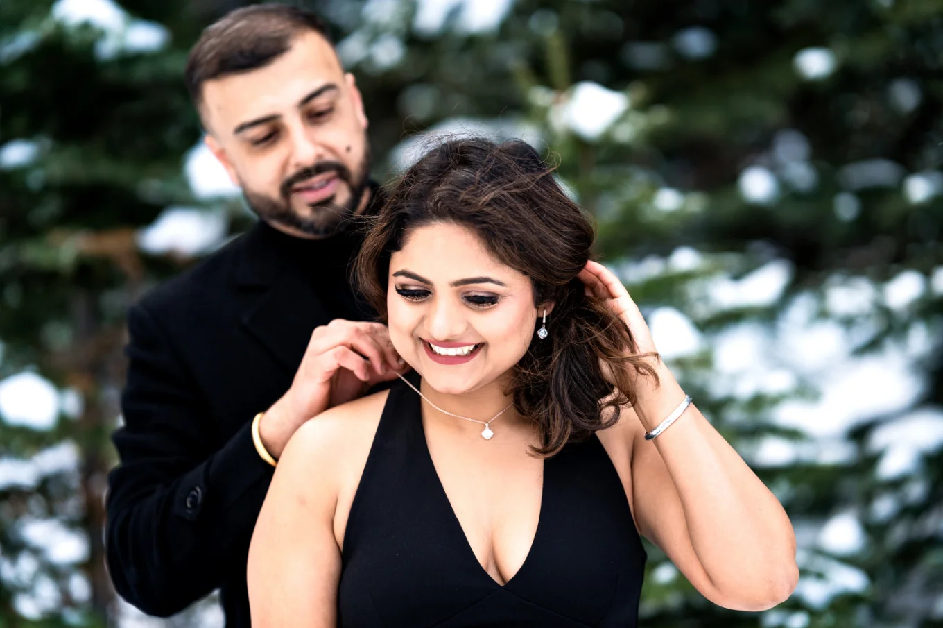 Gentleman puts a Necklaces on his girlfriend's neck