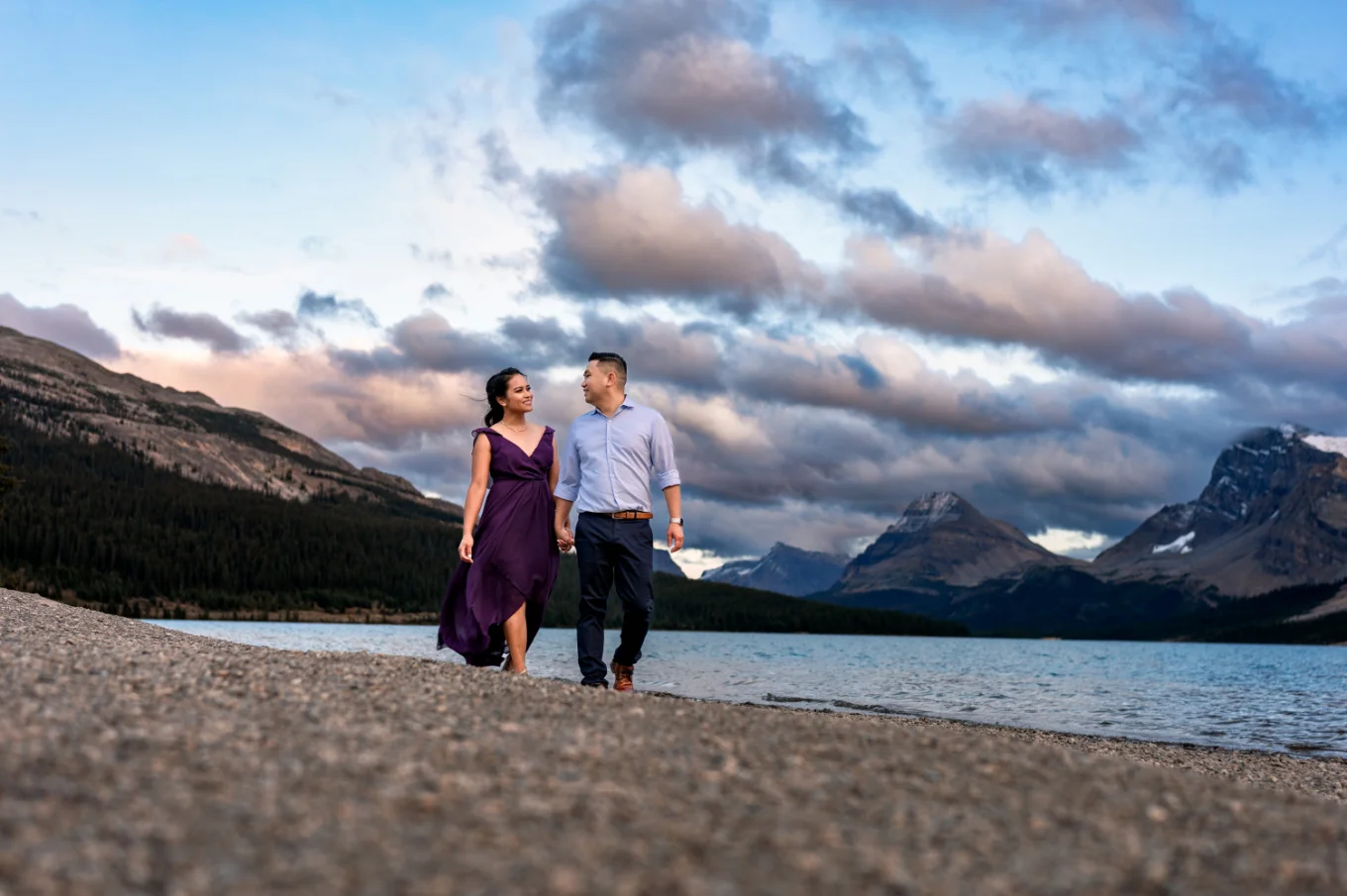 Engagement Photography of the couple walking at Bow Lake