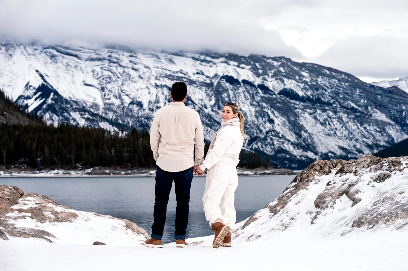 Couple in Love adore the beauty of the Mountains in Banff National Park