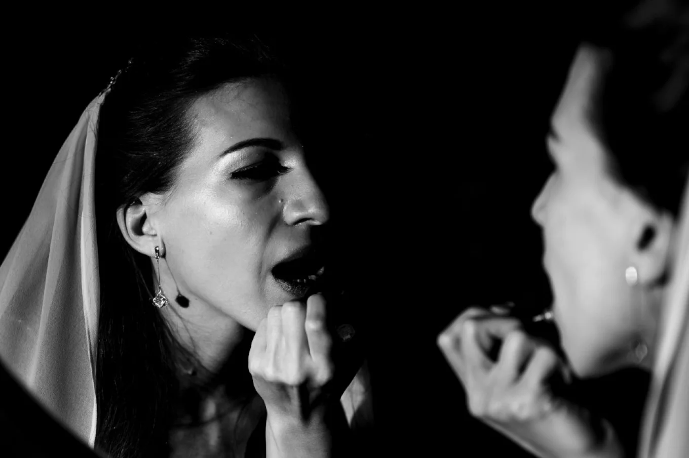 Bride's make up before winter wedding ceremony in Kananaskis Alberta