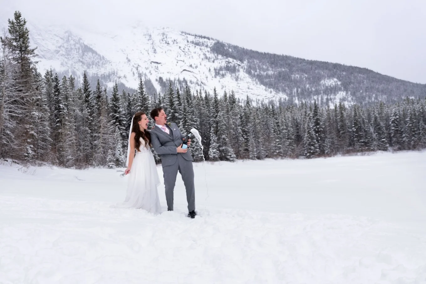 bride and groom celebrating their love at Wedge Pound Kananaskis