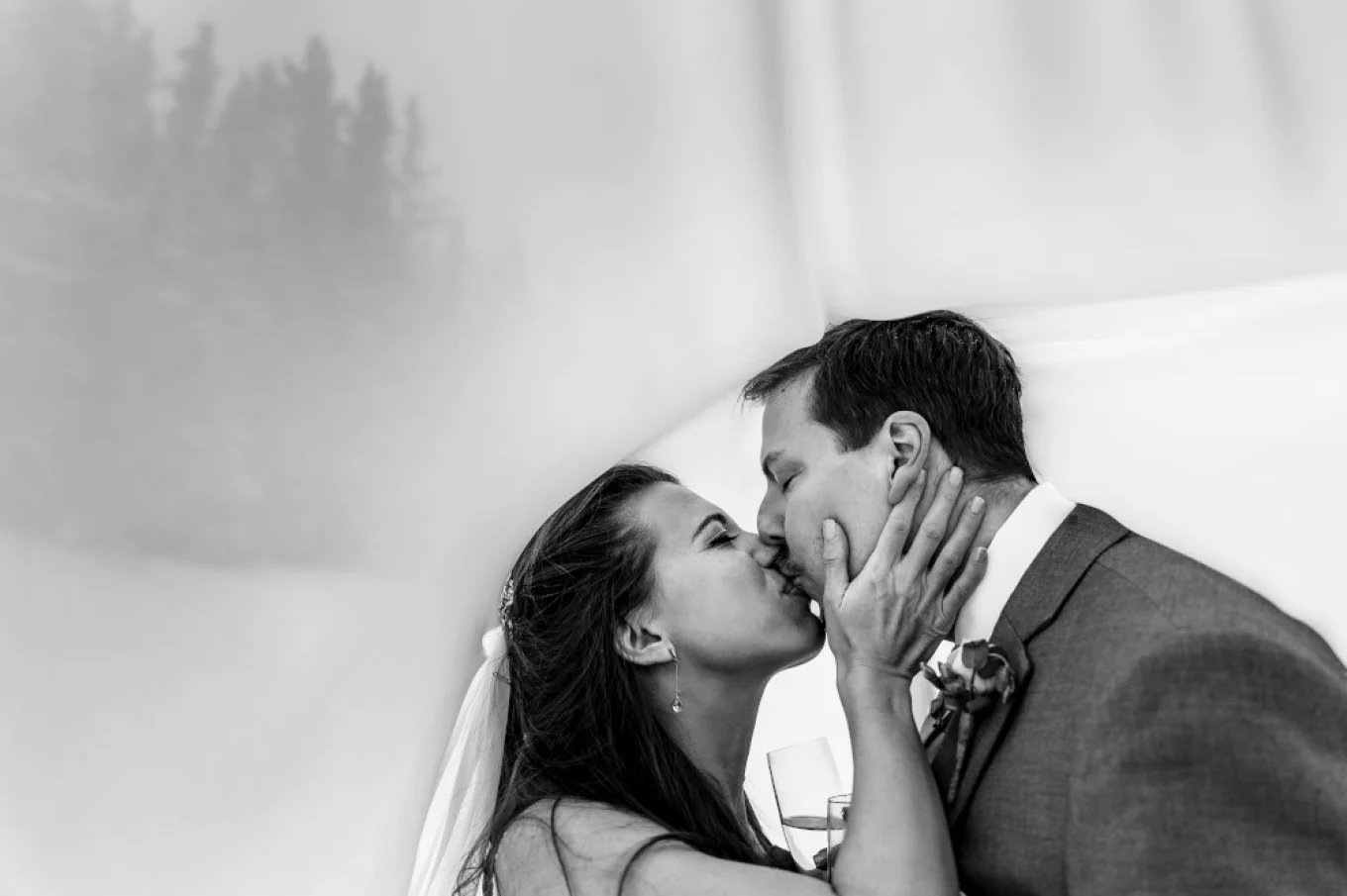 Romantic kiss under the vail