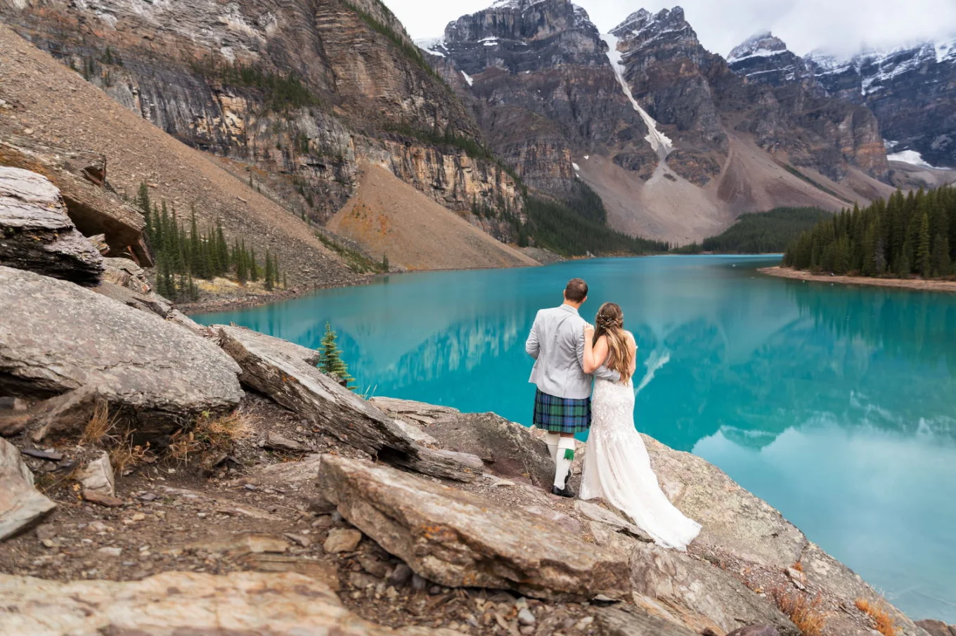 Banff Adventure Wedding Photography with newlyweds at blue Moraine Lake