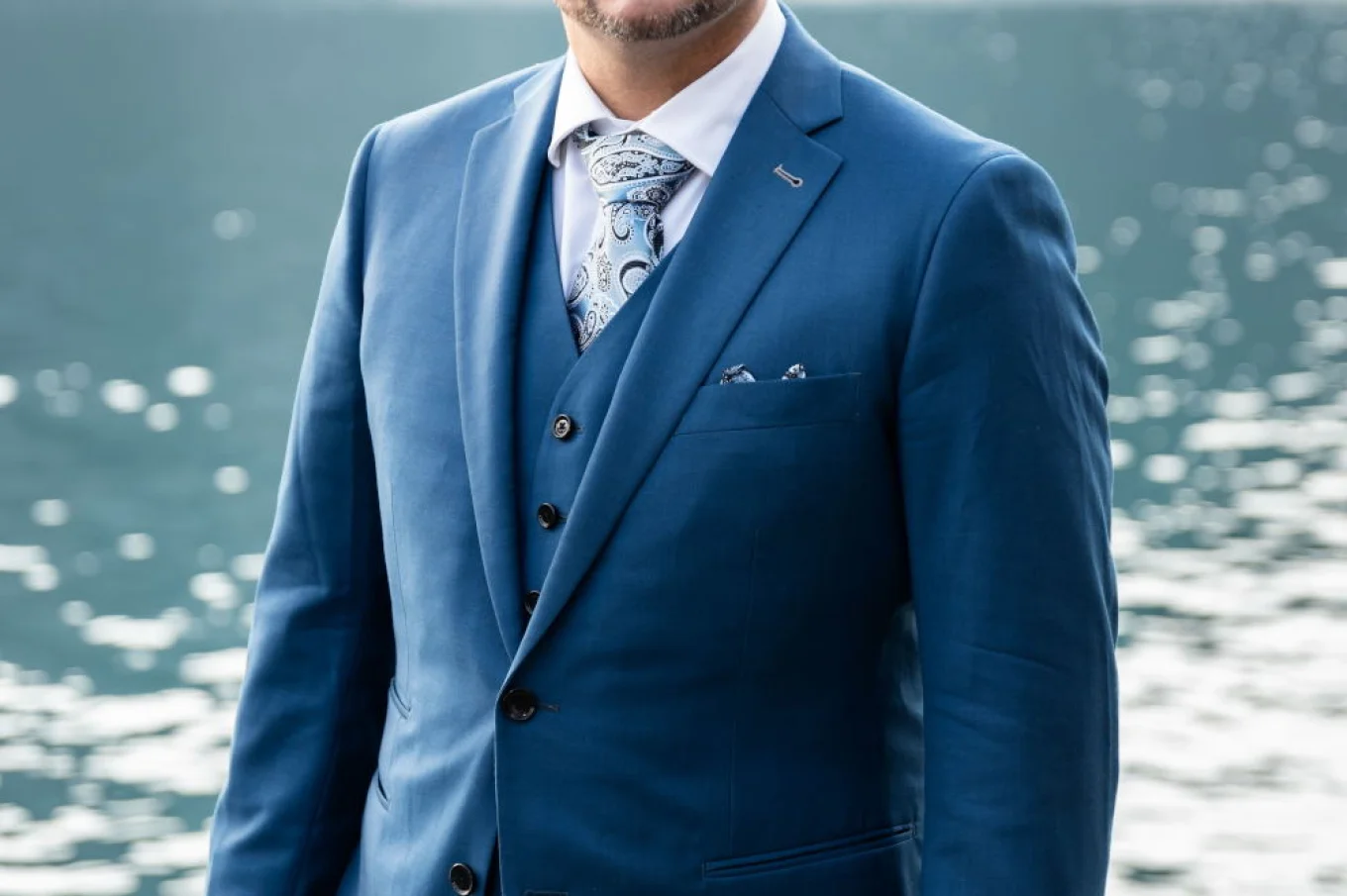 Groom's portrait at Minnewanka Lake.