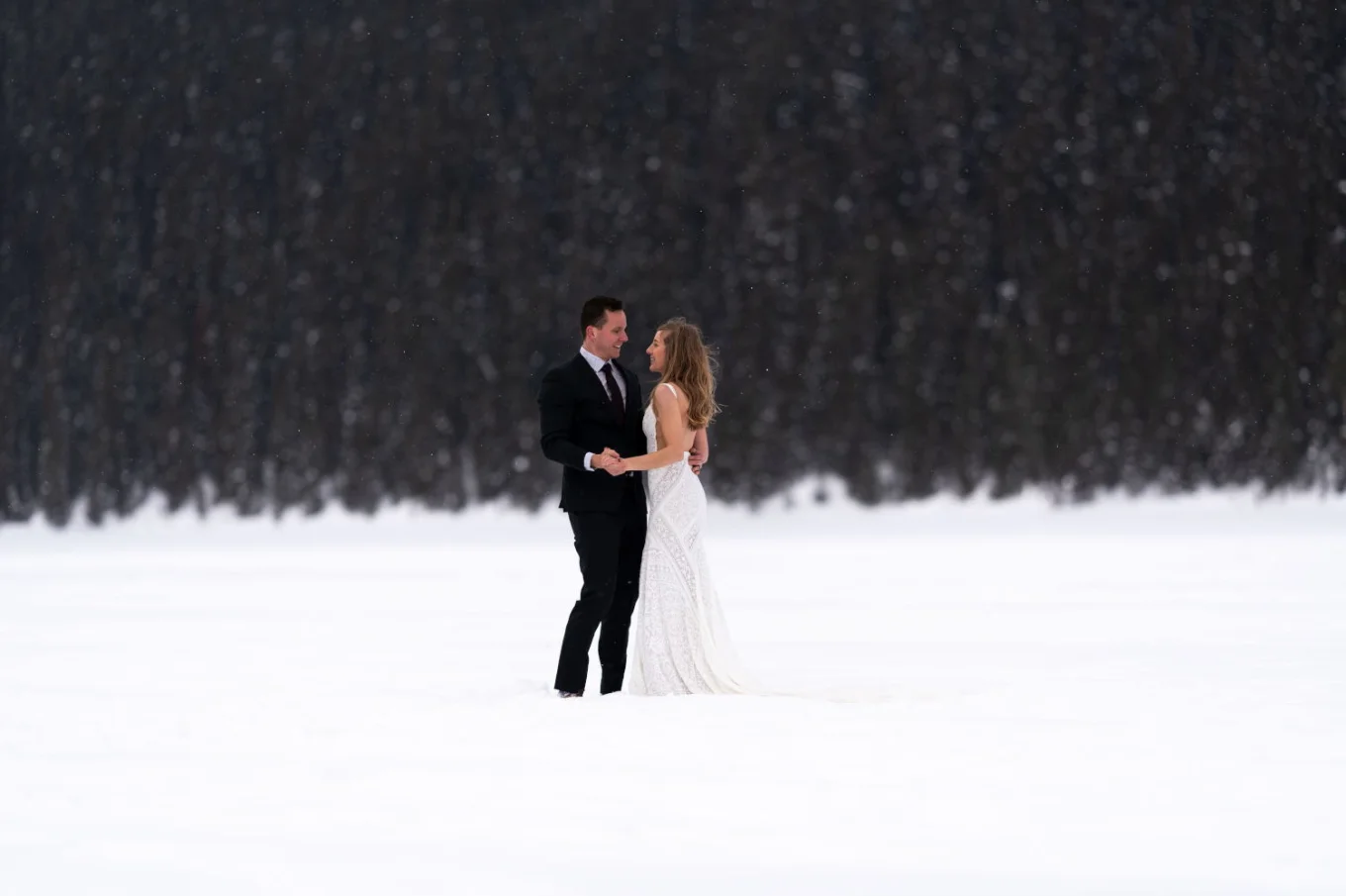 Dancing couple in the snow in Banff