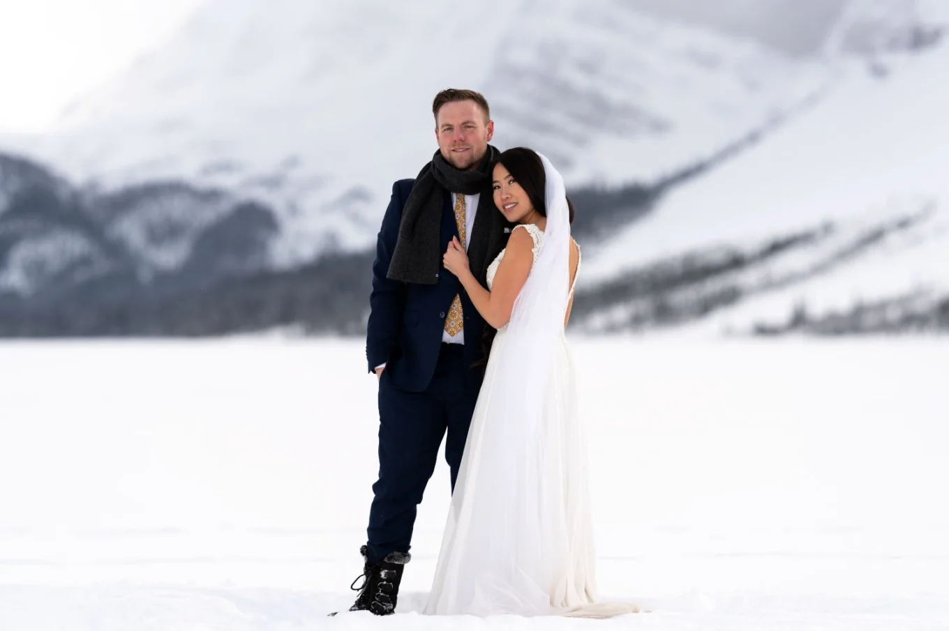 Couple posing during their wedding photo session at Bow Lake
