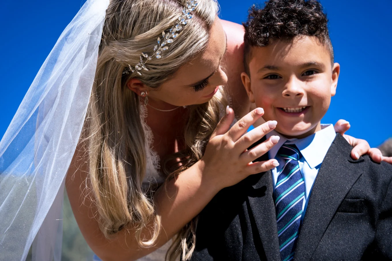 The bride cleans her son face