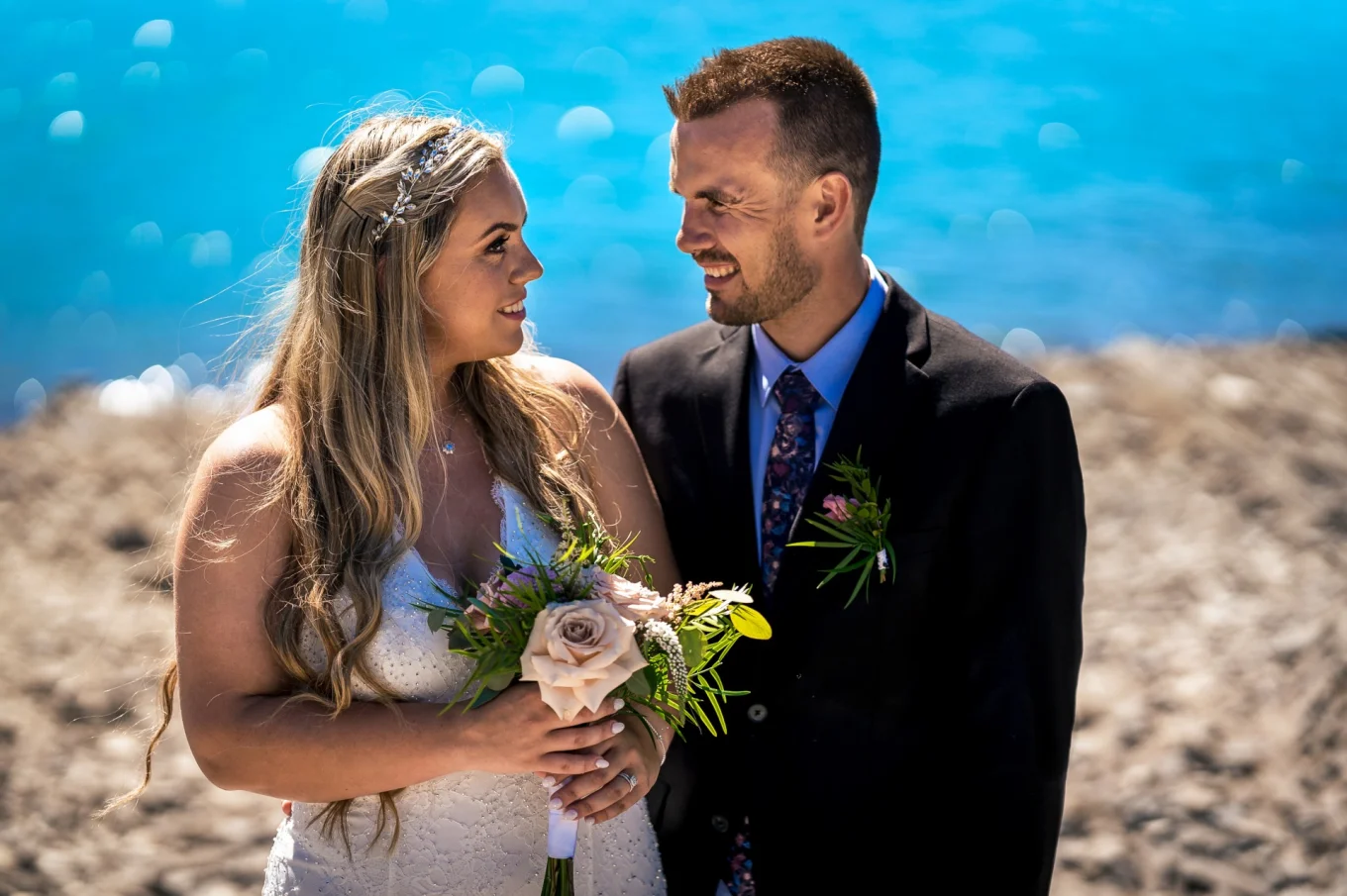 bride and groom look at each other during their wedding day