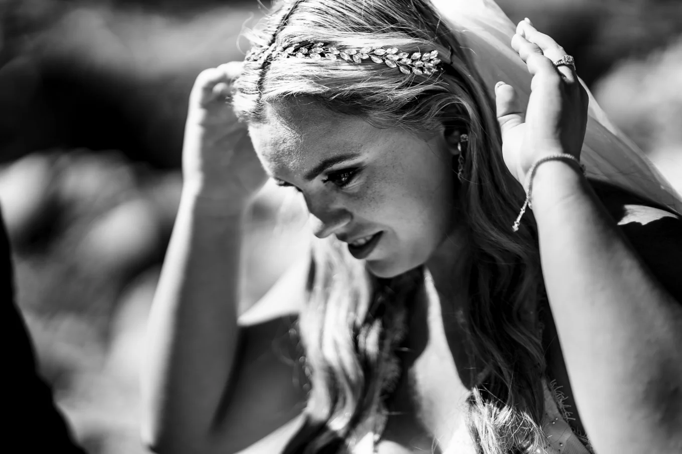bride fixing her vail