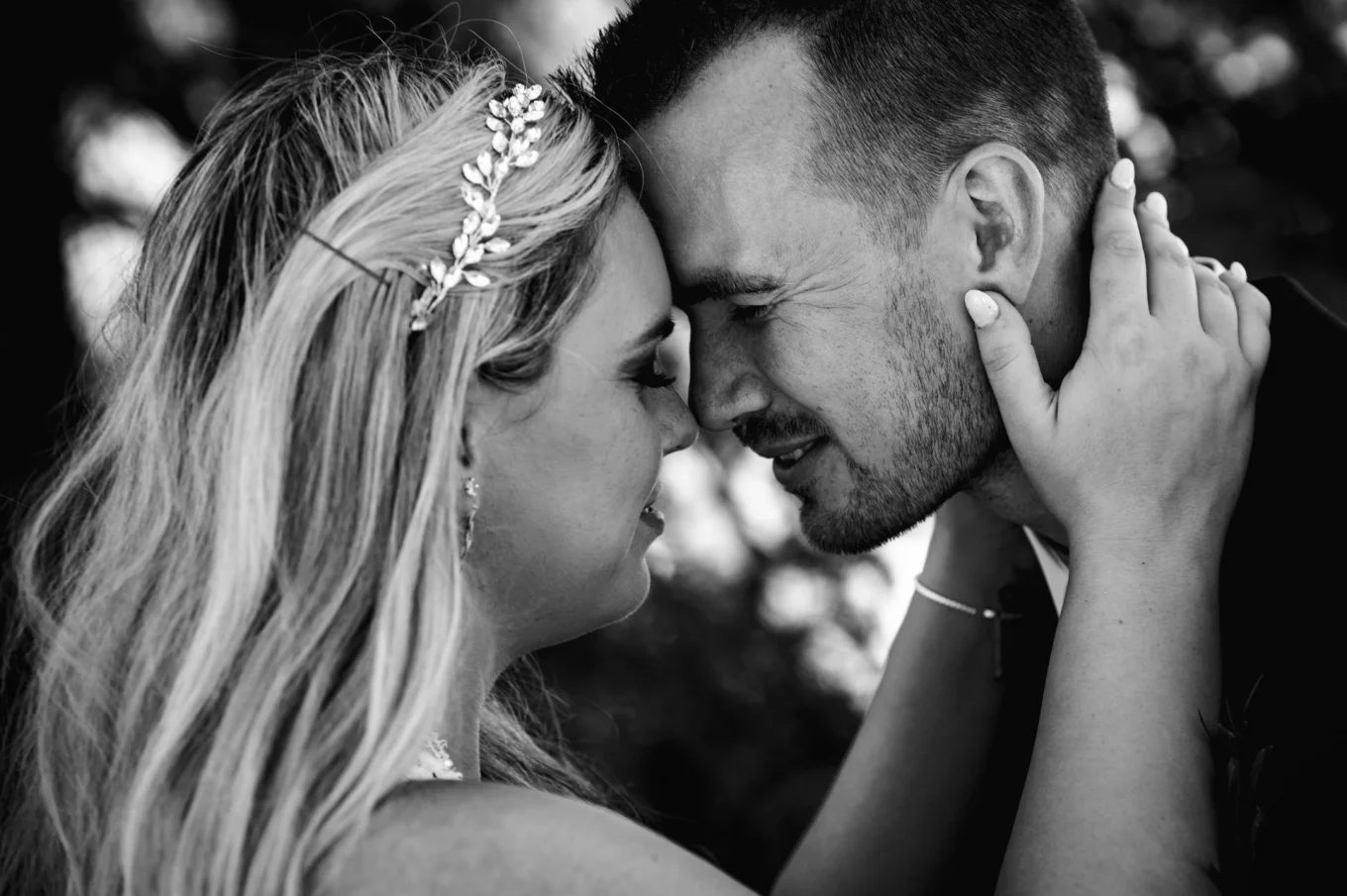 Romantic portrait after elopement ceremony in Banff. newlyweds touching their foreheads