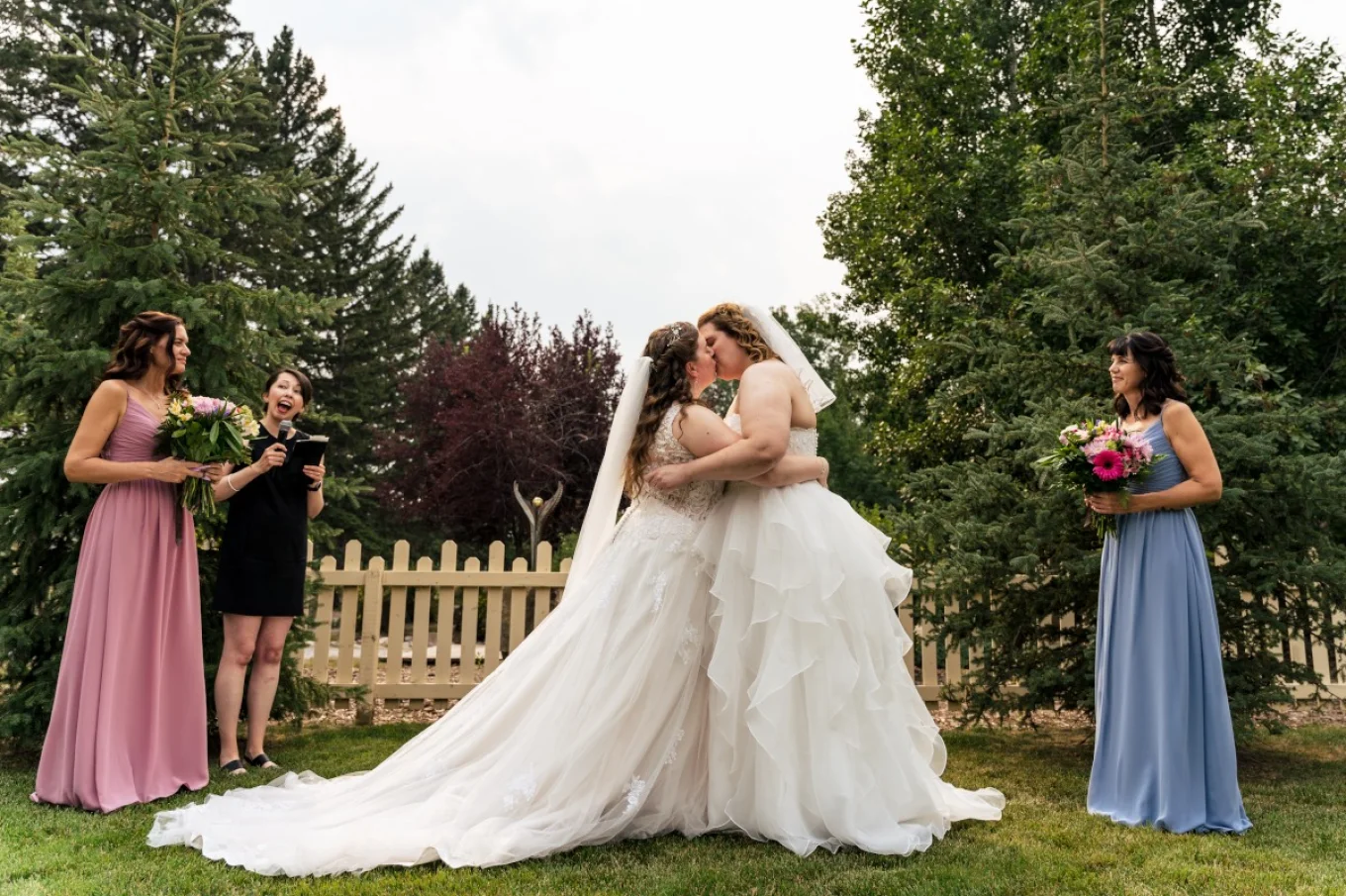 The brides are kissing affer emotional Calgary Elopement