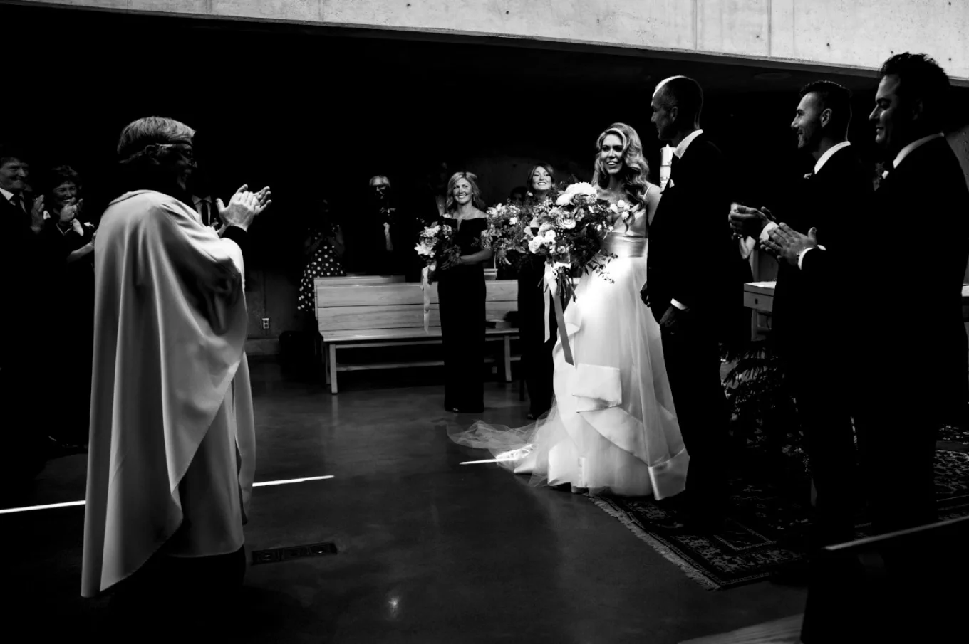 The priest giving a clergy for bride and groom during Calgary wedding Ceremony