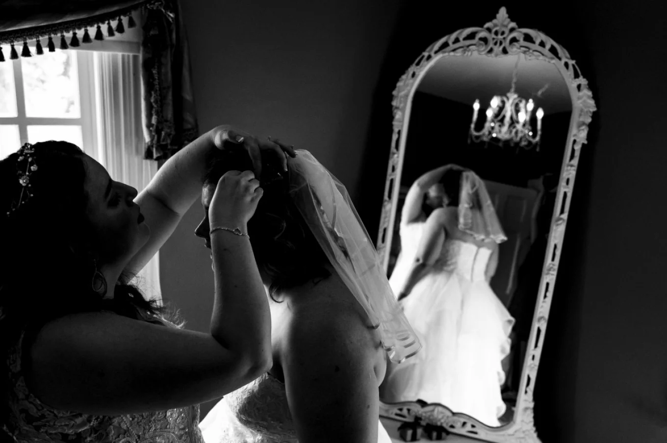 Bride is getting her hair done. Calgary Intimate Wedding .