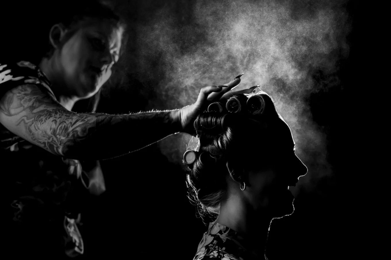 Hairdresser is spraying Brides hair before Wedding Ceremony in Calgary