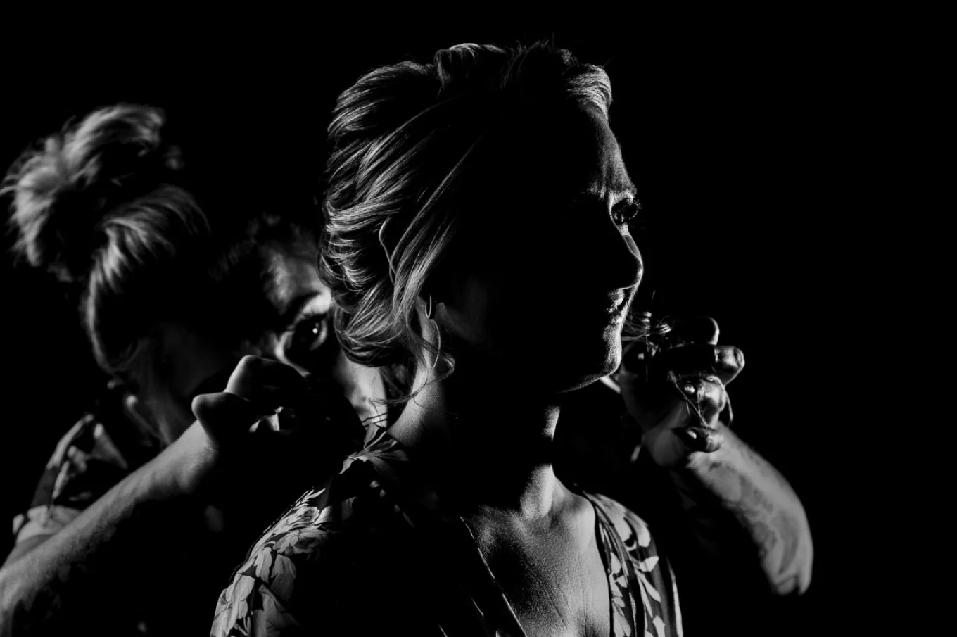 Hairdresser is working on the Bride's hair before Calgary Wedding