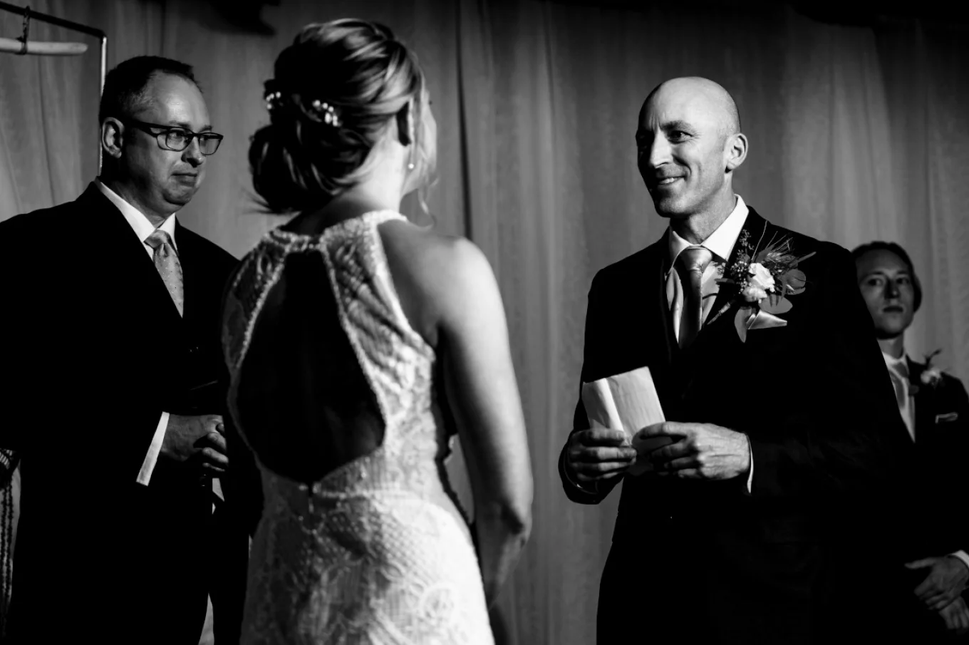 Groom is reading a vows