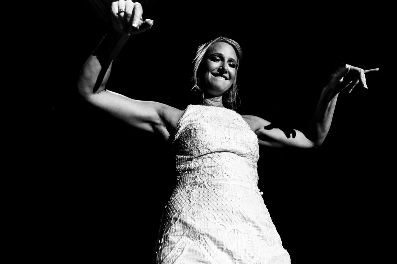 Bride is dancing during Canmore Wedding