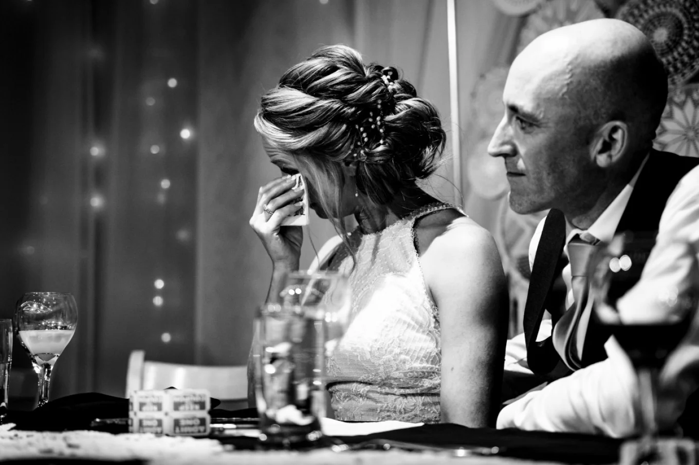Moved bride is crying during the wedding speeches