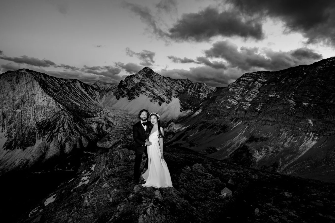 Black and white photography of fearless newlyweds in the Canadian Rockies.