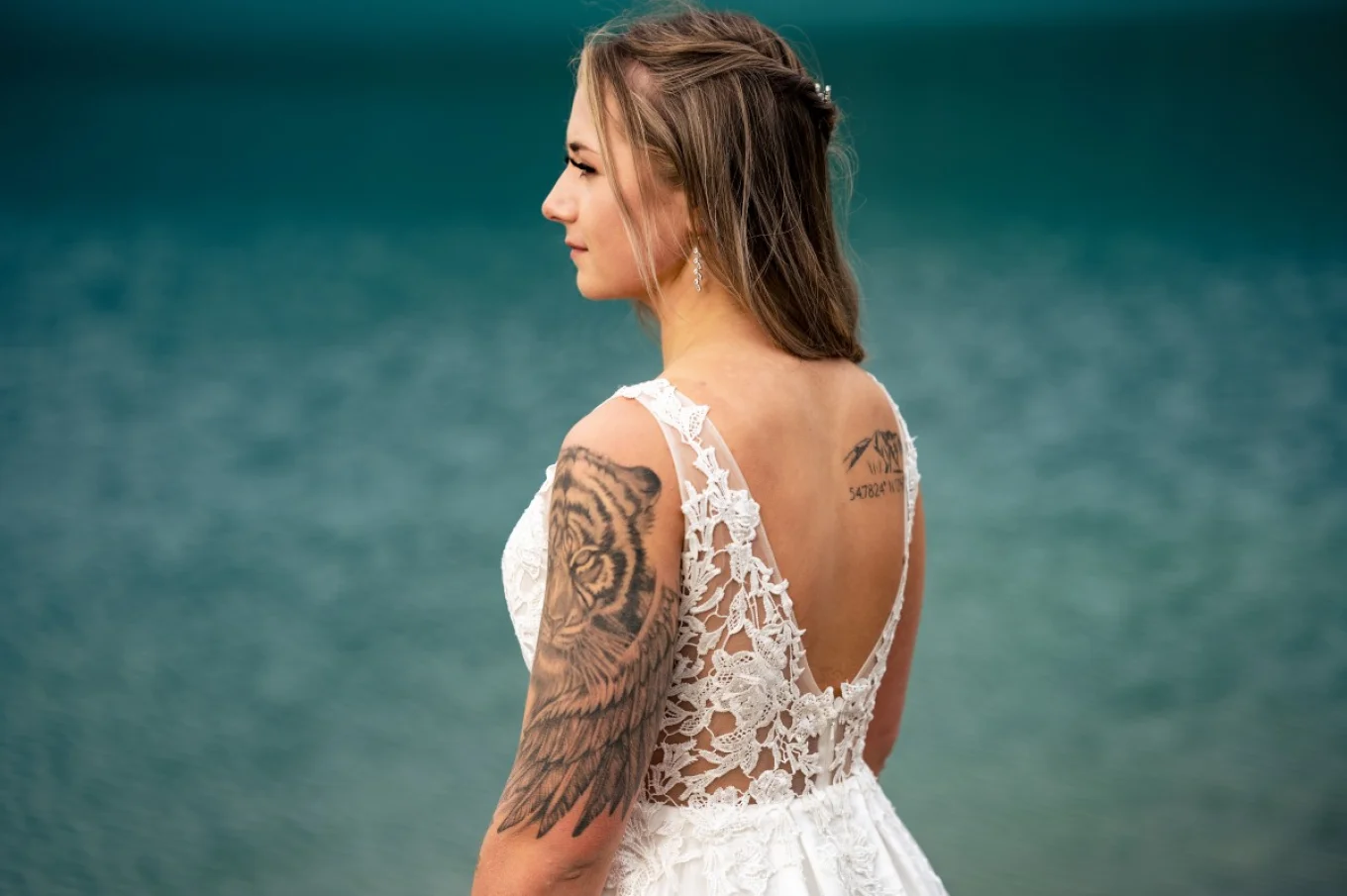 Bride look forward at the lake.