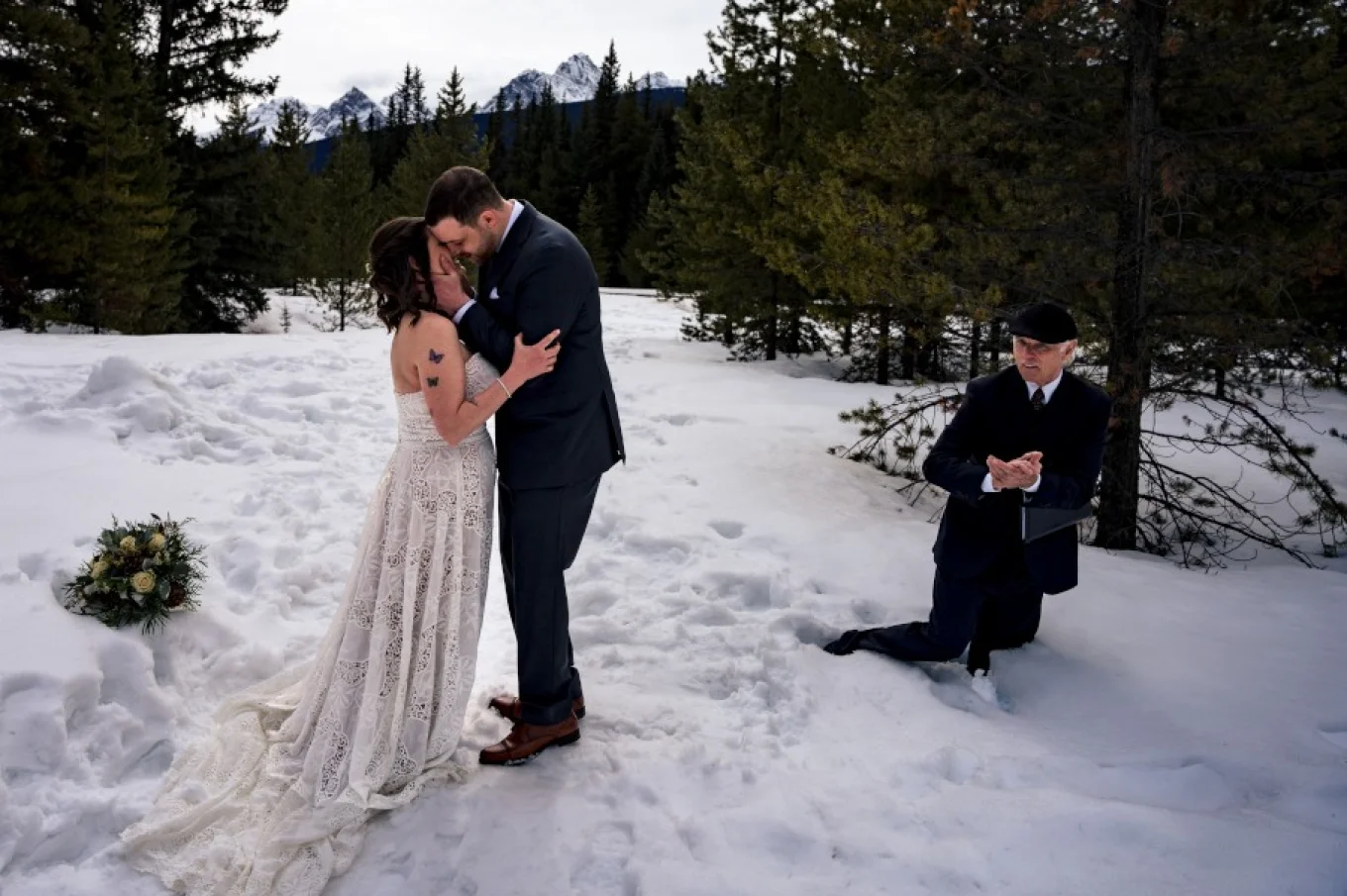 Newlyweds first kiss. Commissioner fall into a deep snow.