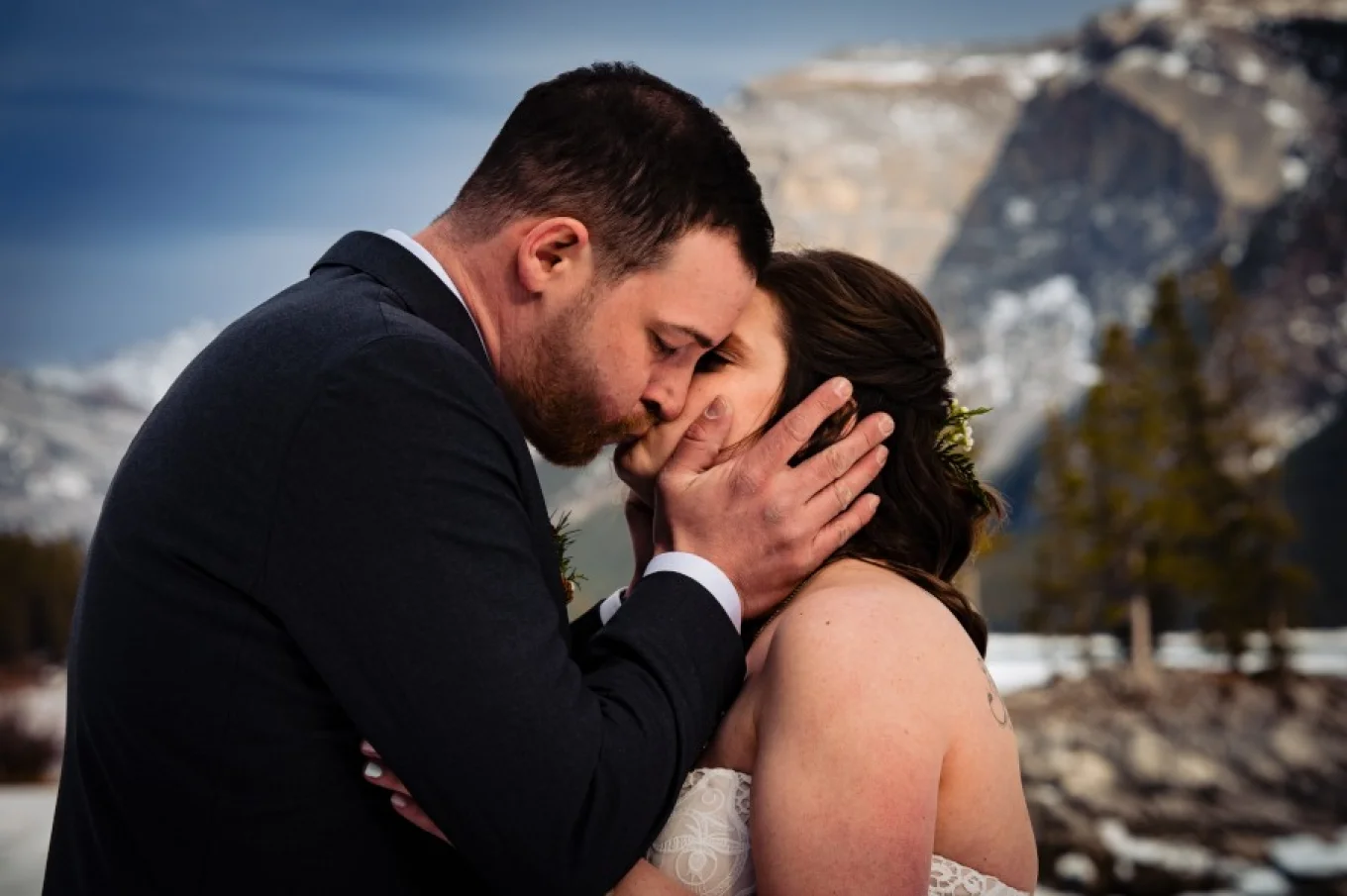 Groom kisses the bride.