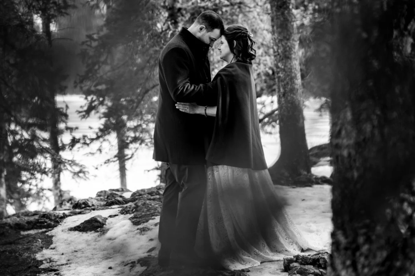 Couple in love hug and look into each others eyes.