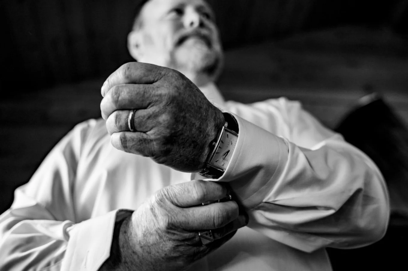 Groom's father in law getting ready for a wedding ceremony.