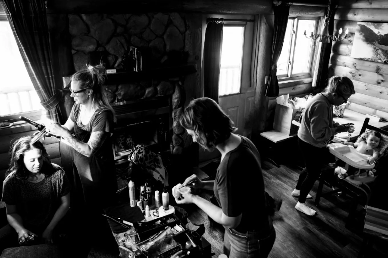 Before the wedding ceremony in the cabin. All ladies are getting ready before Banff elopement.