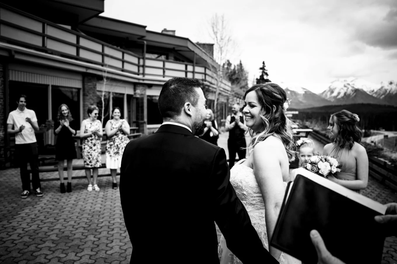 bride and groom look at each other after their Banff Wedding Ceremony. Photo taken in black and white by Banff Wedding Photographers.