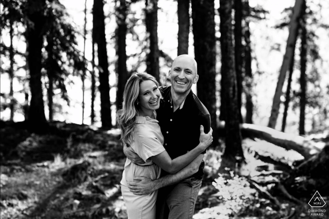 Calgary Wedding Photographer captured real emotions and happiness of newly engaged couple . Diamond Award Photography.
