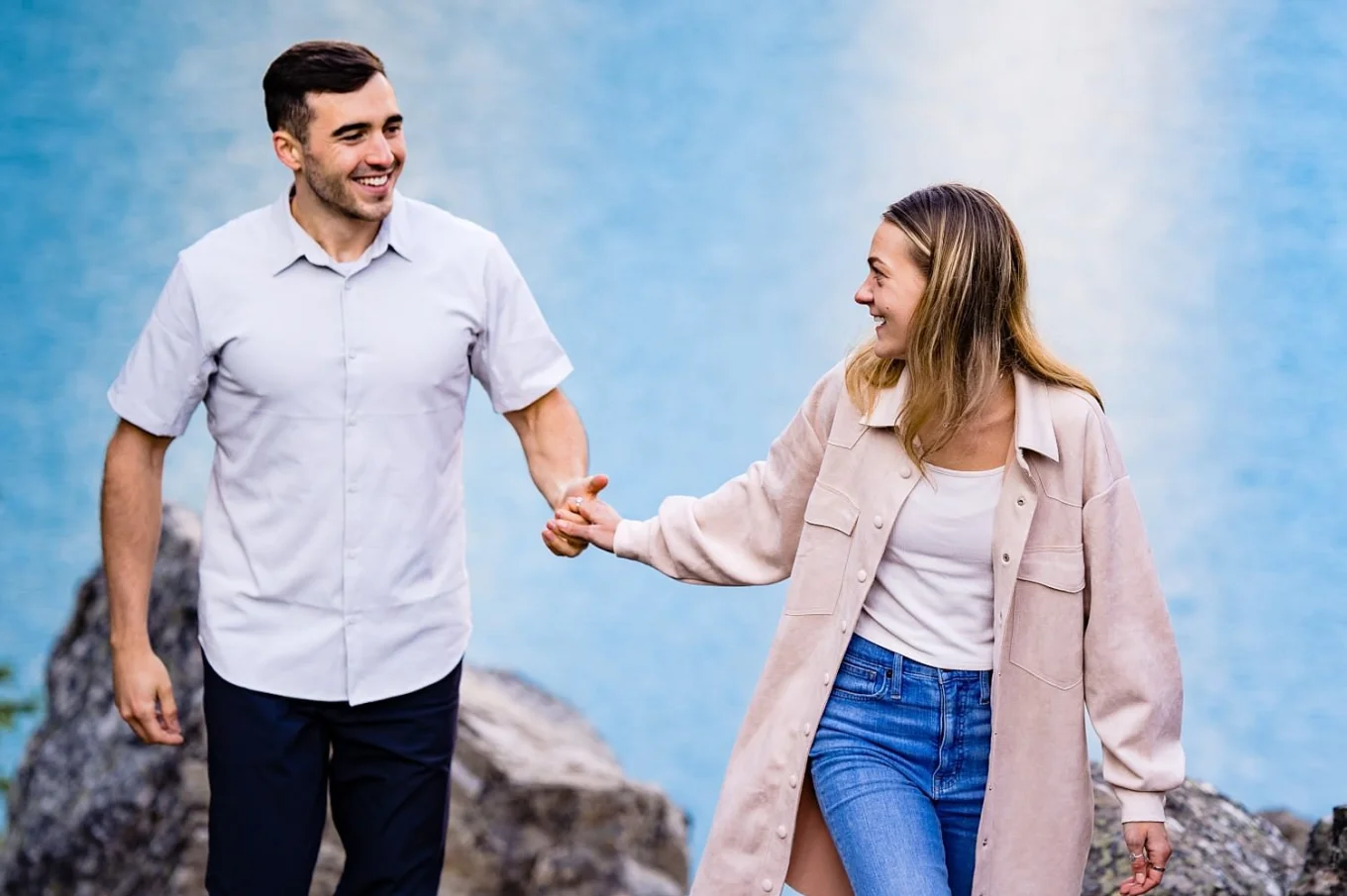 Banff engagement shoot for couple walking hand in hand.
