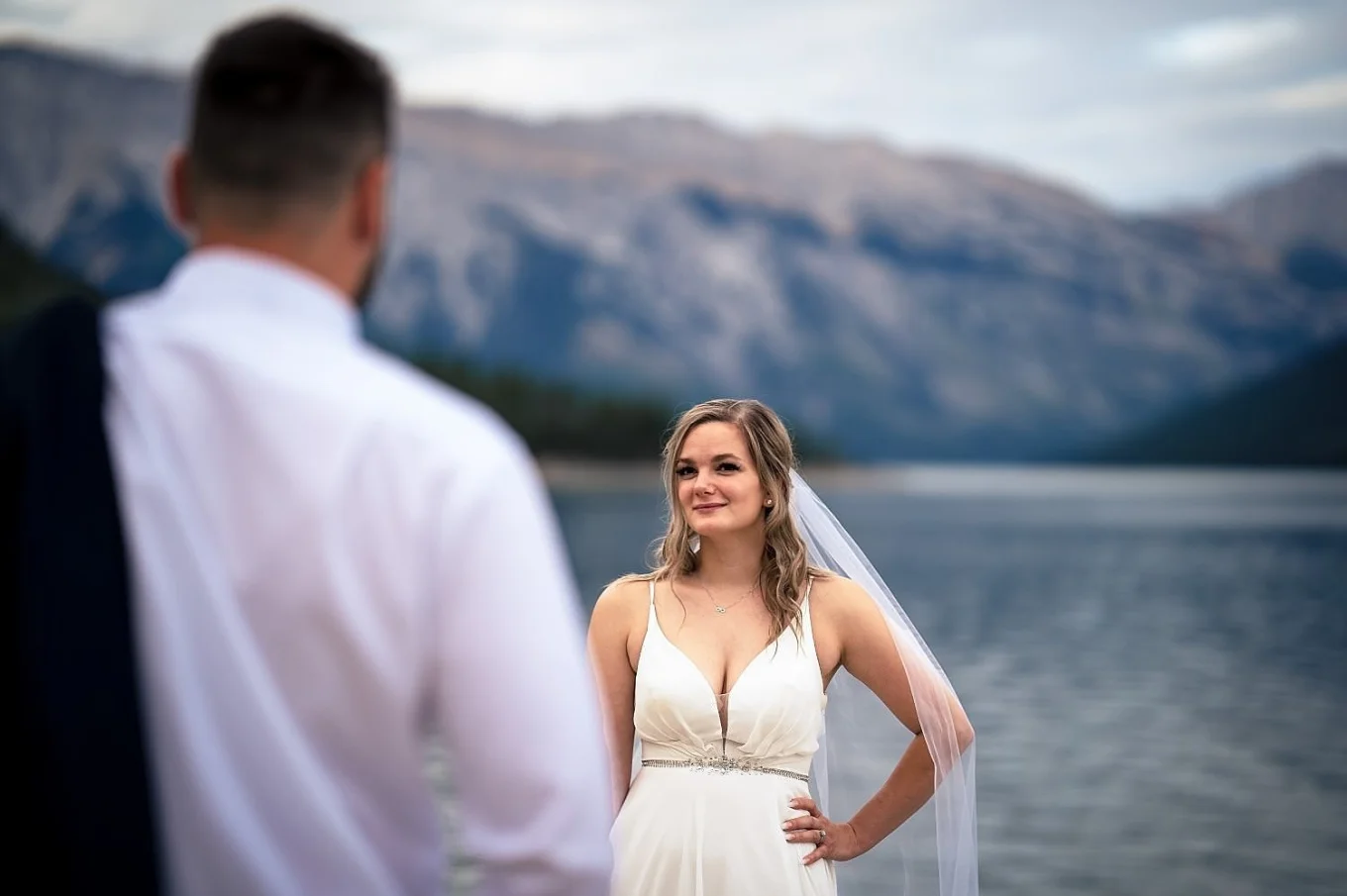 Beautiful bride look at the groom with love.