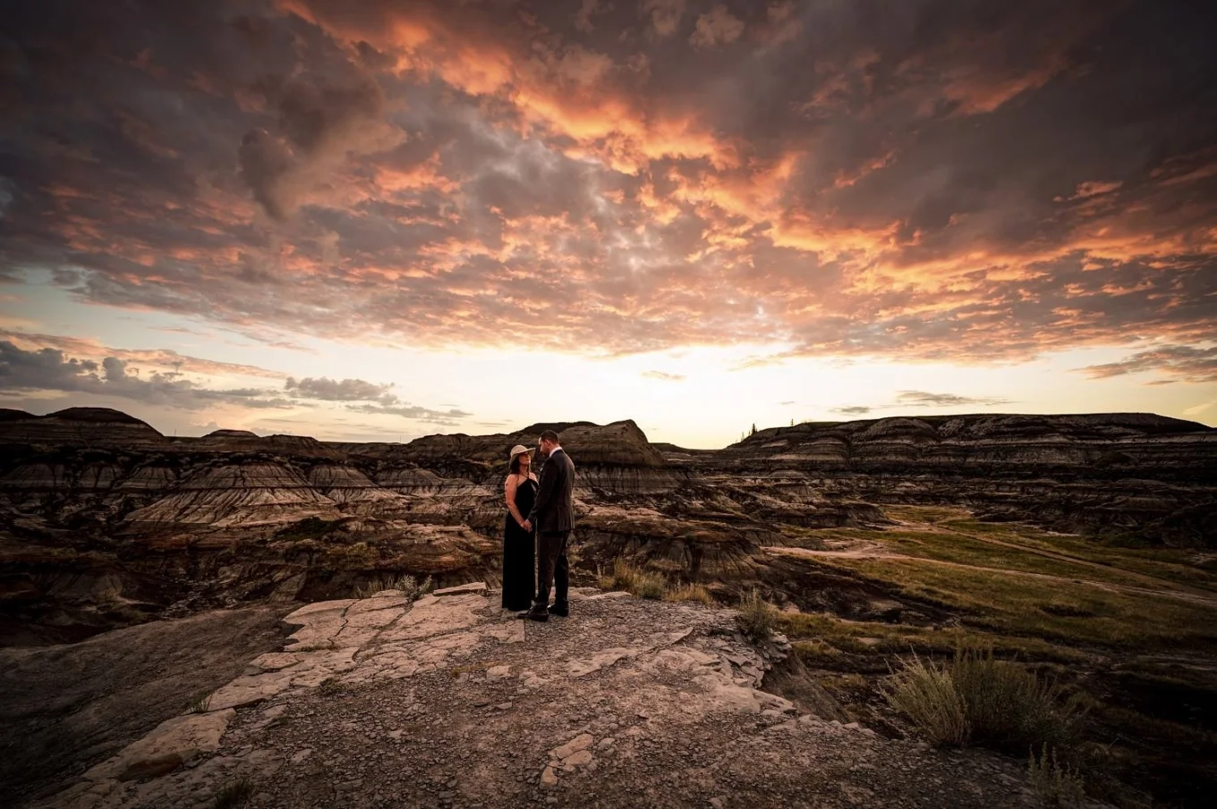 Couple in love holds their hands during their after-wedding session with Calgary Wedding Photographers.