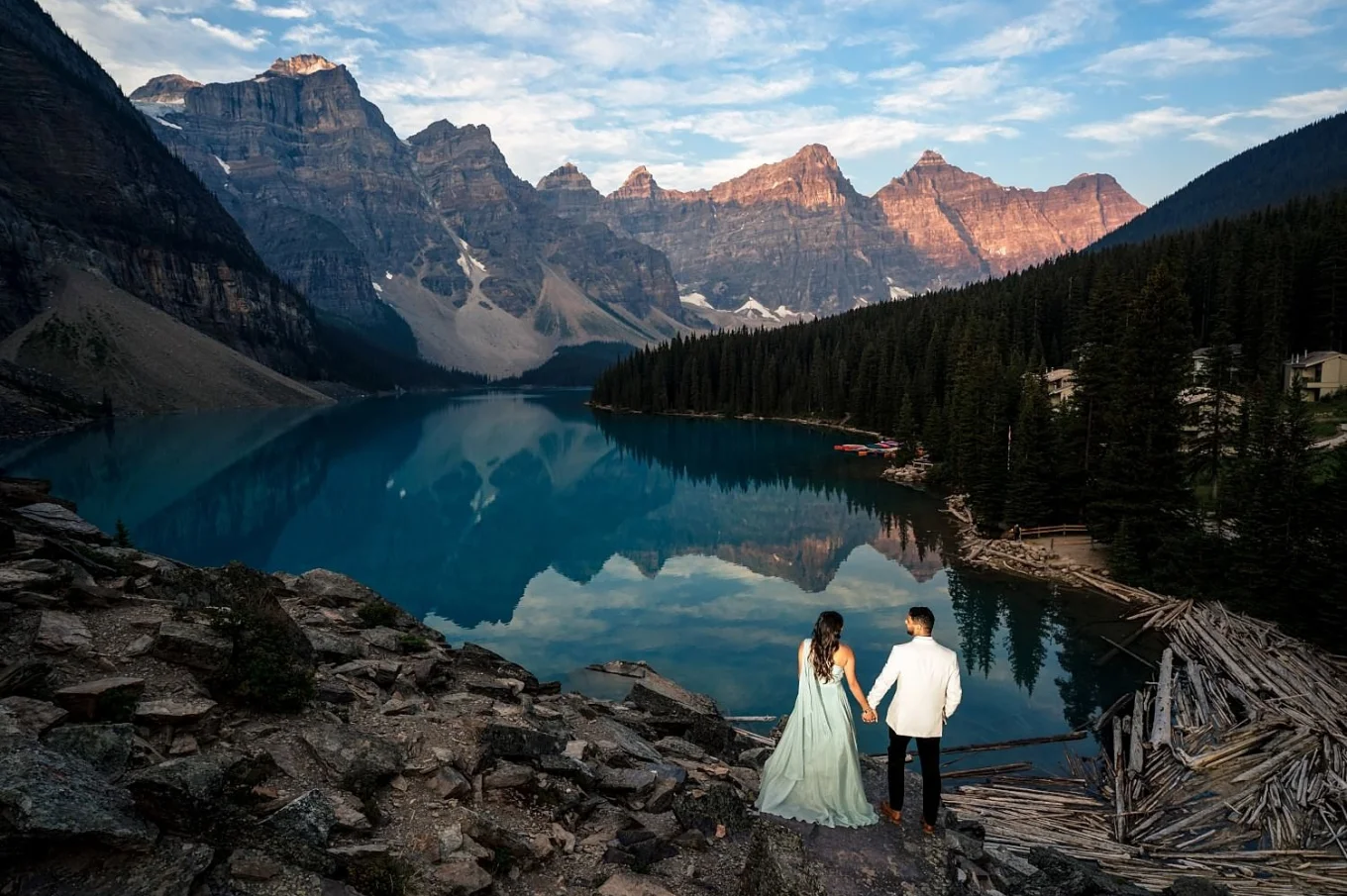 engaged couple adore the view of Moraine Lake.