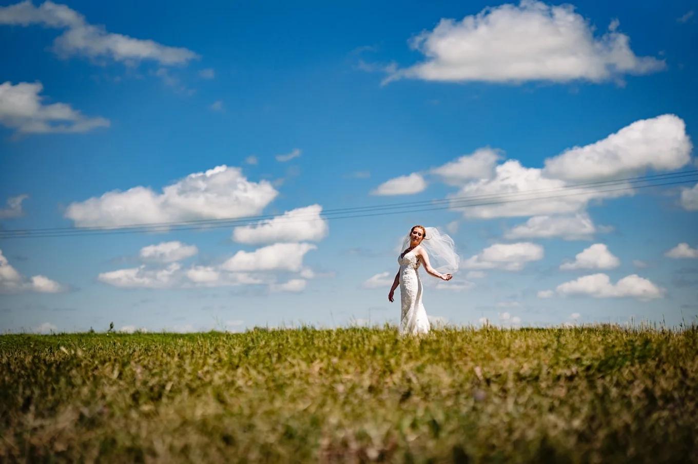 Beautiful bride's portrait on the filed in Calgary.