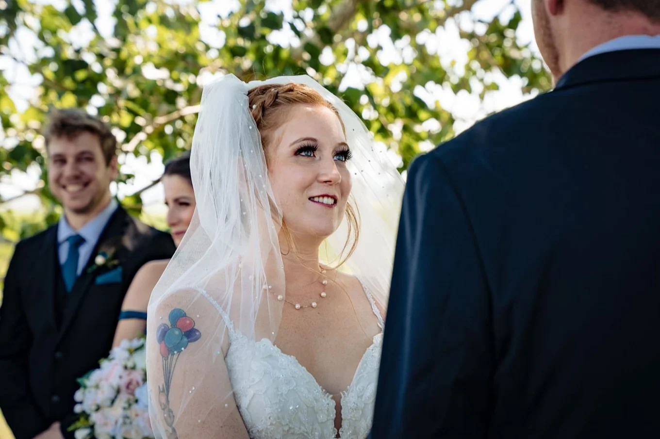 Bride looks deeply into the groom eyes during the Calgary Wedding Ceremony.