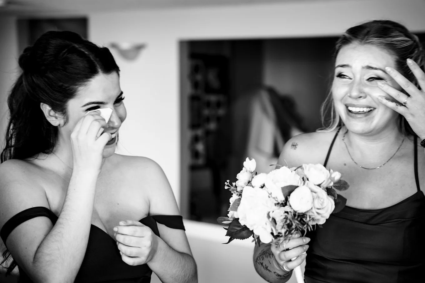 Bridesmaid cry and lough during the wedding in Calgary.