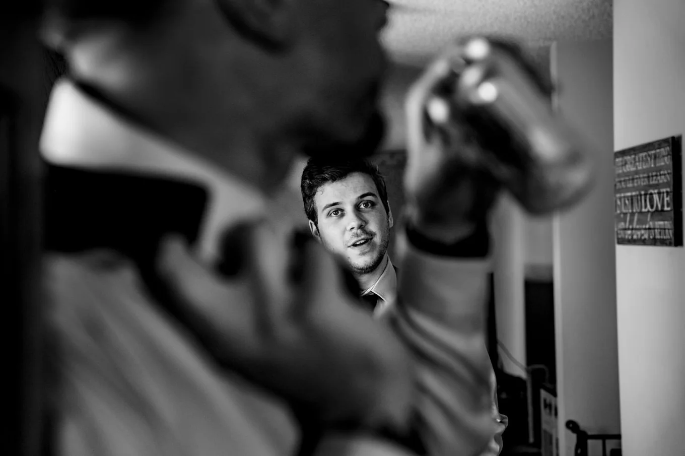 best-men's photograph through the hand of the man drinking a beer.