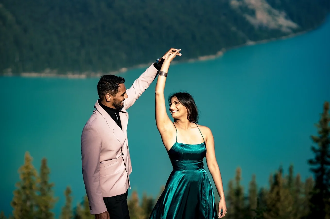 Couple dance by the lake.