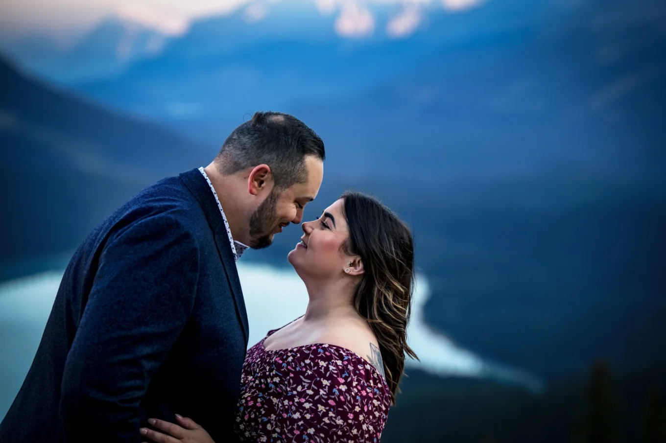 Funny portrait of couple in love touching their noses.