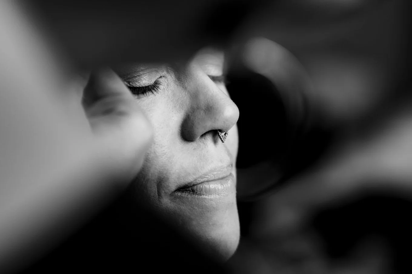 Black and white photograph of the bridesmaid face.