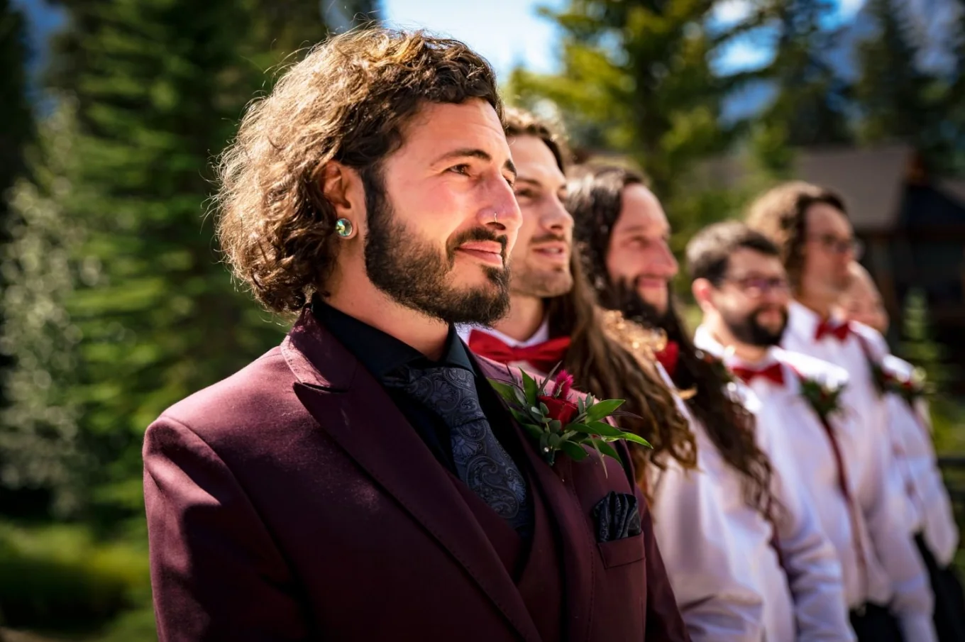 Groom and groomsmen wait for the bride in one lane.