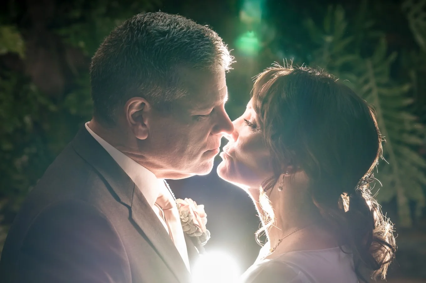 Intimate kiss of the newlyweds.
