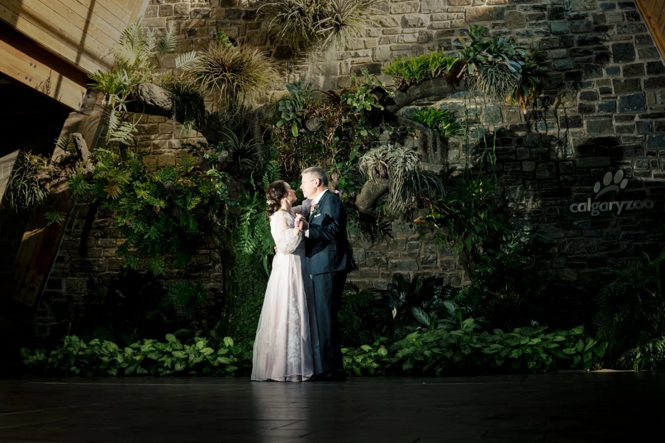 First Dance of bride and groom at Calgary Zoo venue.
