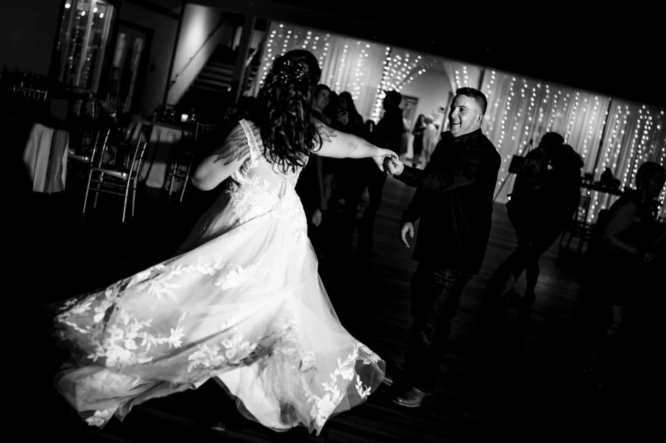 Fantastic moment of on the dance-floor captured by Calgary Wedding Photographer of newlyweds dancing.